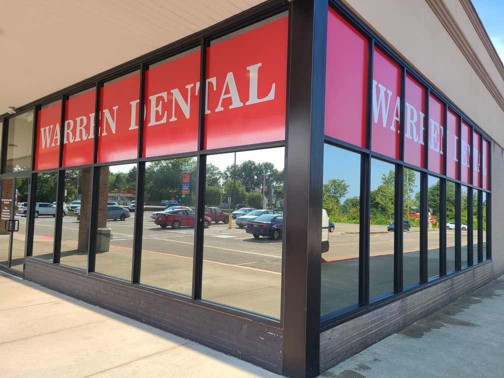 New custom graphics & window film facade at warren dental - graphics and commercial window tinting in the akron area.
